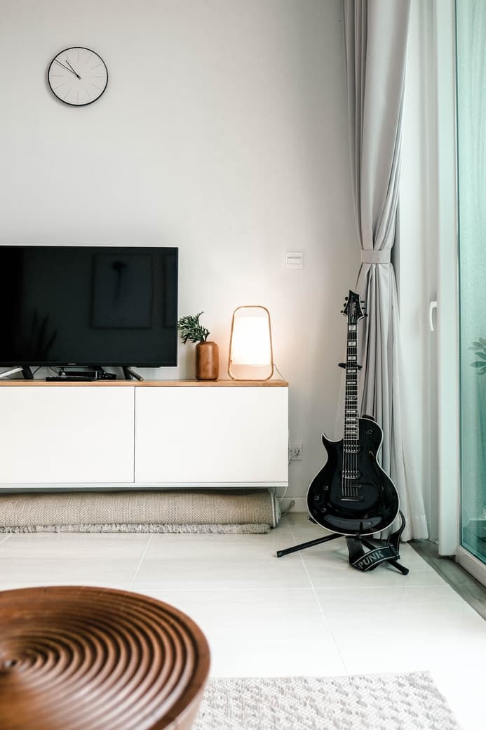 Living room TV setup with wall-mounted television